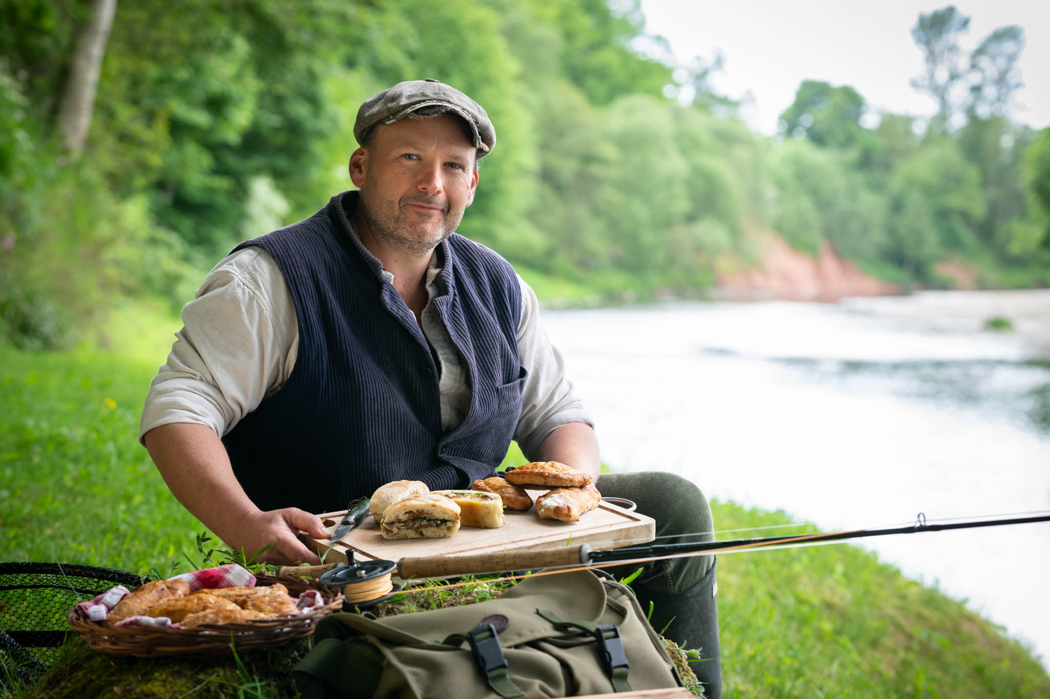 Tom Godber-Ford Moore with a picnic board of venison pasties and pan bagnat by the North Esk