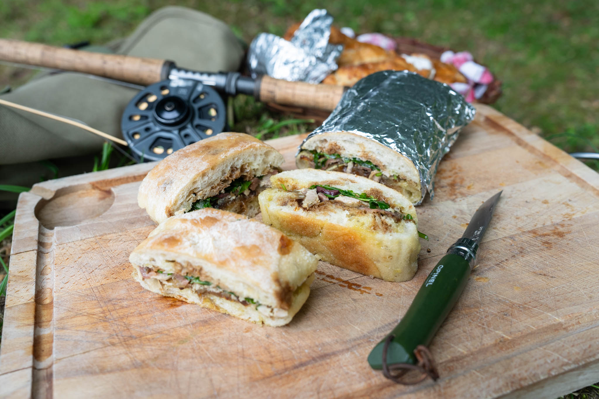 Close-up of sliced pheasant pissaladière pan bagnat and venison pasties